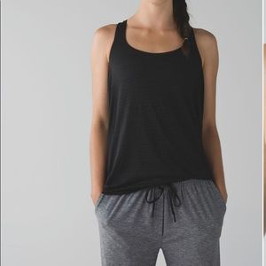 Lululemon Wild Tank. Size 4. Color: Black/ white and pink floral print bra.